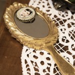 Oglinda cu maner mireasa auriu 13*1*27 cm, Clayre&Eef